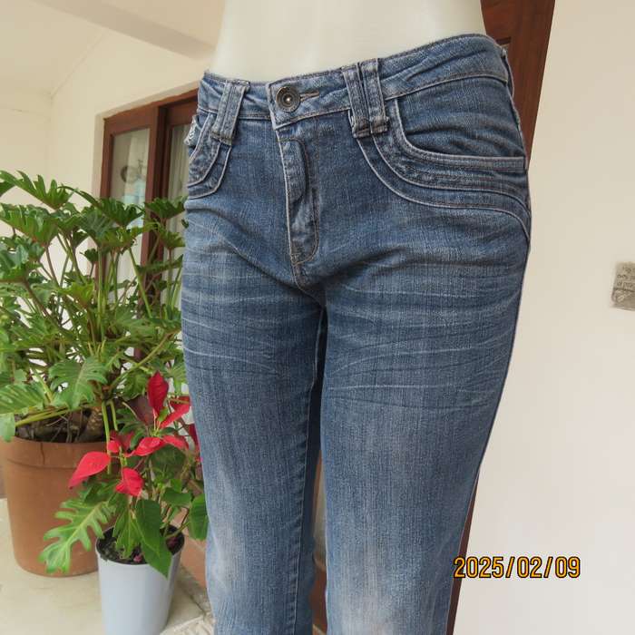 Sexy high quality blue denim stretch polycotton bootcut jeans. Size 32-34. With 5 pockets. As new