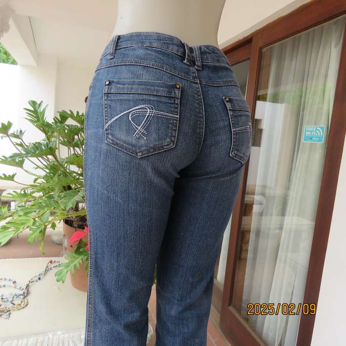 Sexy high quality blue denim stretch polycotton bootcut jeans. Size 32-34. With 5 pockets. As new