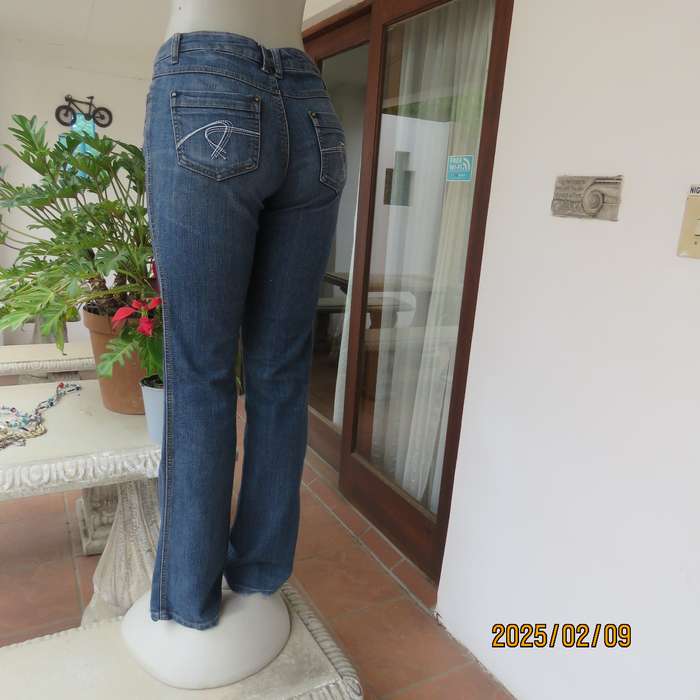 Sexy high quality blue denim stretch polycotton bootcut jeans. Size 32-34. With 5 pockets. As new