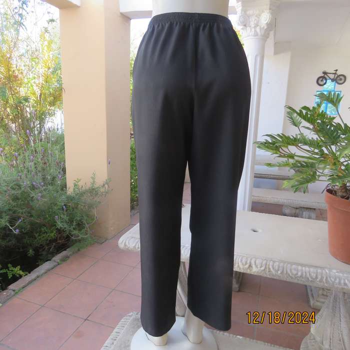 High quality black pants by Bhs from London size 40. In soft polyester. Waist back/sides elasticated