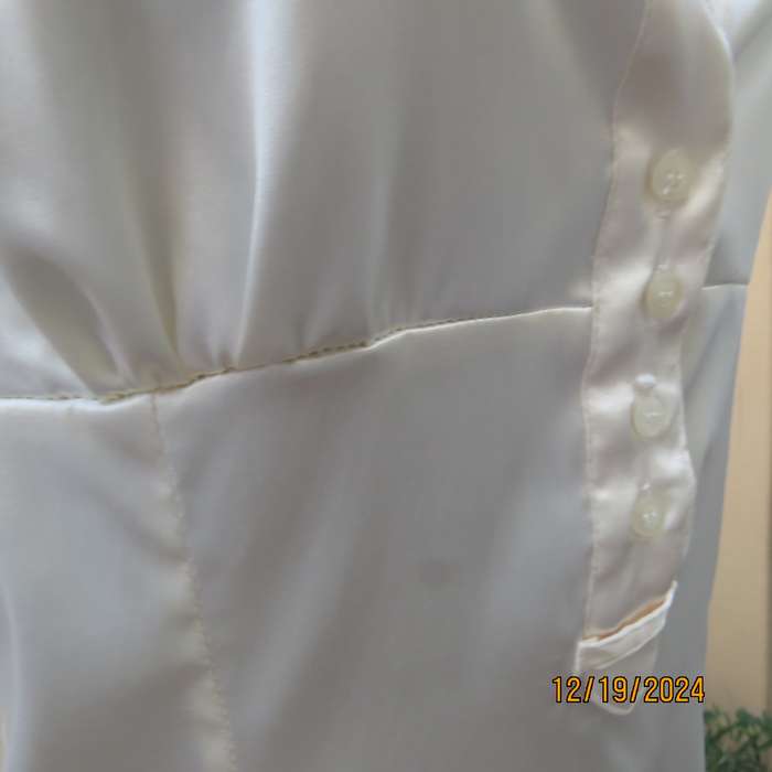 Best quality ZARA rich cream empire capped sleeve top. Polyester stretch. Size 36. Brand new cond.