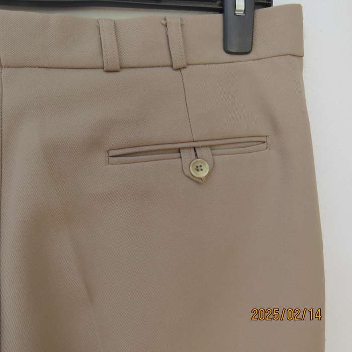 BRONZINI men's rich cream textured 100% polyester pants. Size 36. Size and 1 back pocket. As new