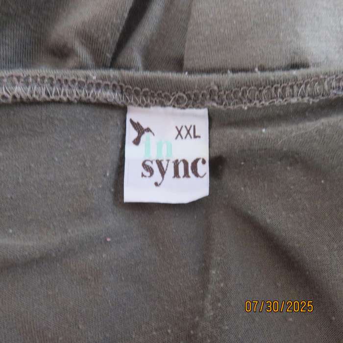 Olive green poly-viscose slip over top with scooped neckline. Pleats on front. Size 38