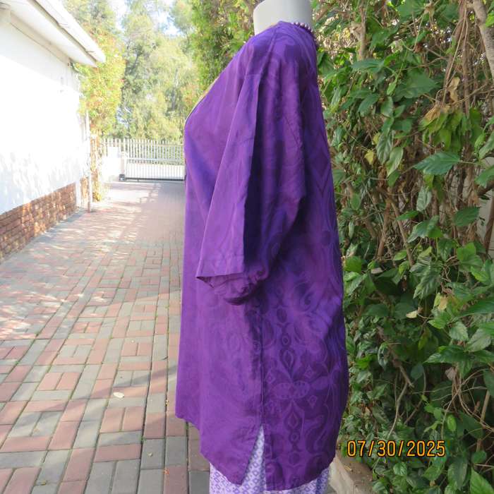 Purple print ethnic short sleeve slip over top with colourful bib. Size 38