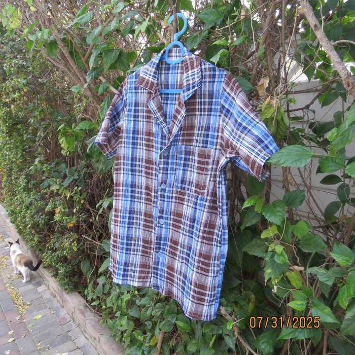 Men's blue and brown check short sleeve size small shirt in bubble poly-rayon.