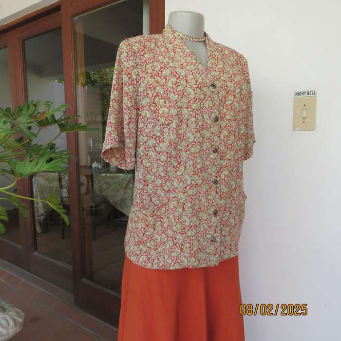 Boutique made silky polyester short sleeve jacket-top. Paisley print. Size 42