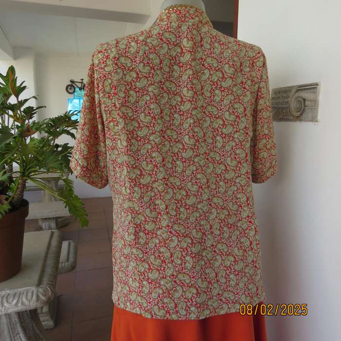 Boutique made silky polyester short sleeve jacket-top. Paisley print. Size 42