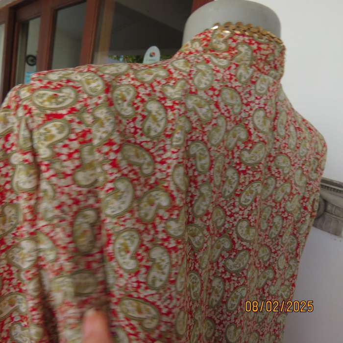 Boutique made silky polyester short sleeve jacket-top. Paisley print. Size 42
