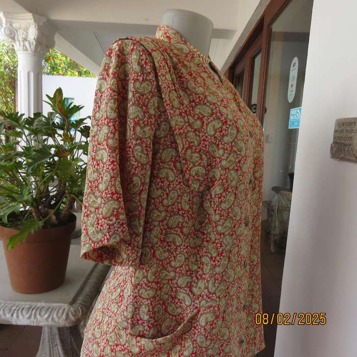 Boutique made silky polyester short sleeve jacket-top. Paisley print. Size 42