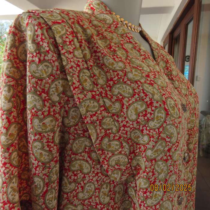Boutique made silky polyester short sleeve jacket-top. Paisley print. Size 42