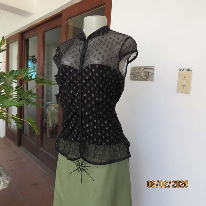 WWW black sheer polyester with oval glitter pattern peplum top. Size 36