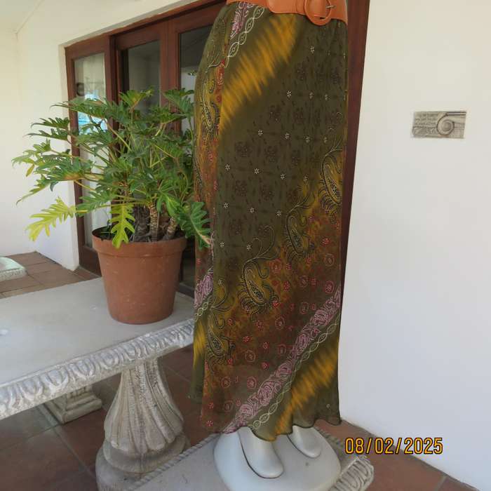 J brand ethnic straight lined sheer polyester skirt in shades of green-gold-red. Size 40