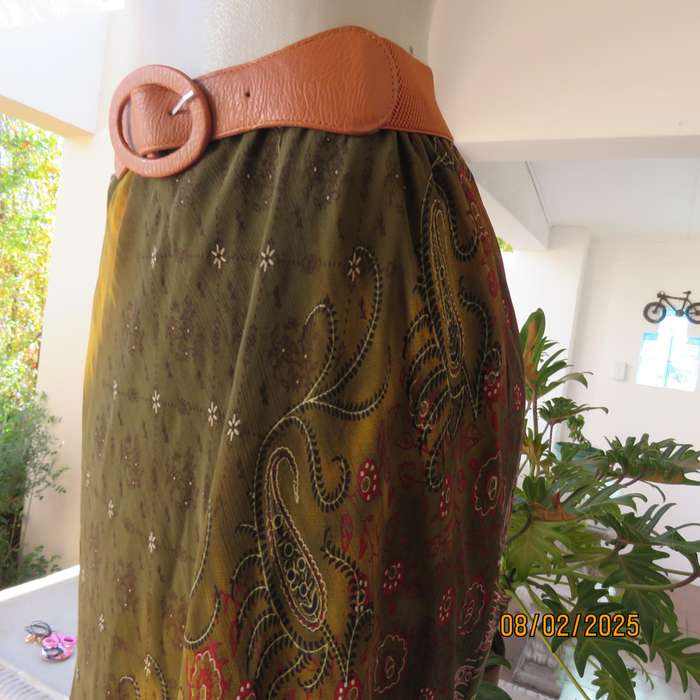 J brand ethnic straight lined sheer polyester skirt in shades of green-gold-red. Size 40