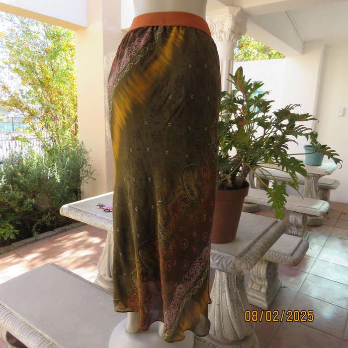 J brand ethnic straight lined sheer polyester skirt in shades of green-gold-red. Size 40