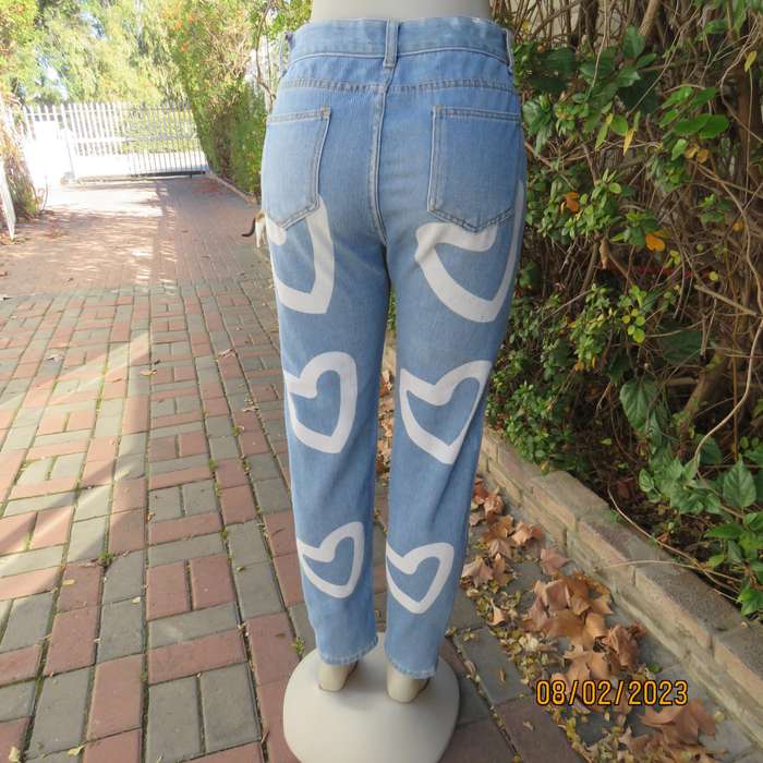 FRG blue polycotton denim jeans with white hearts. Size 34.