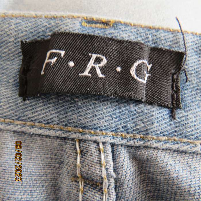 FRG blue polycotton denim jeans with white hearts. Size 34.
