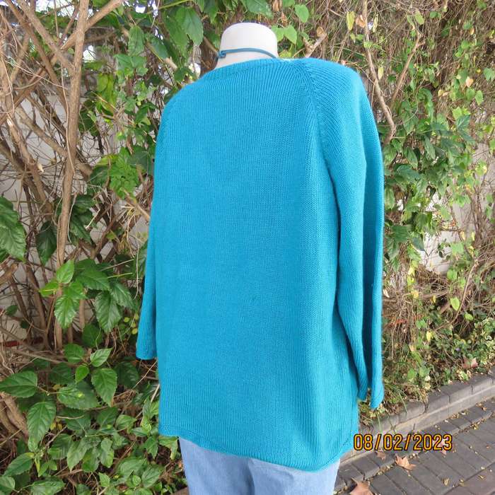 Turquoise handknitted acrylic yarn pull over cardigan with V neck. Size 44-46