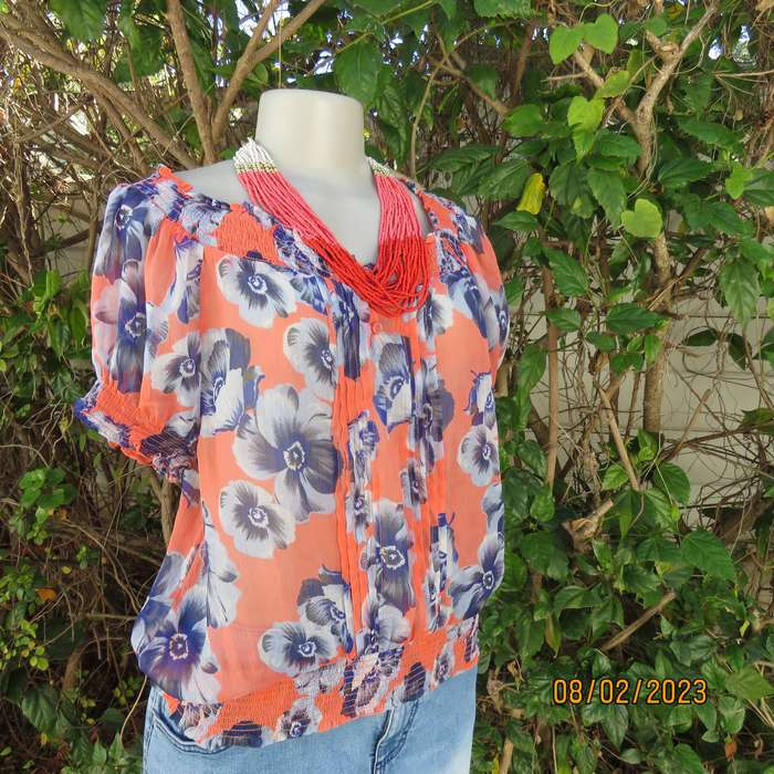 PAPAYA sheer polyester top in salmon with blue flowers. Wide elasticated neckline.Size 38