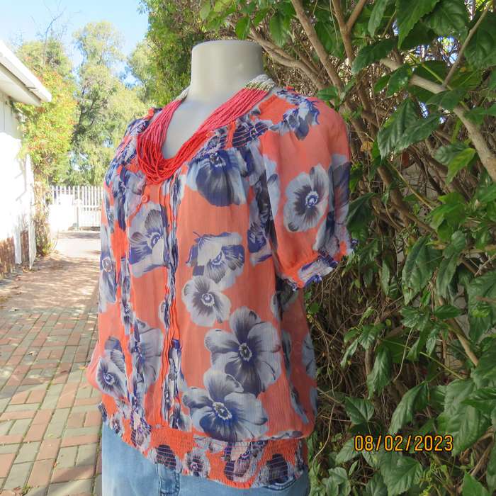 PAPAYA sheer polyester top in salmon with blue flowers. Wide elasticated neckline.Size 38