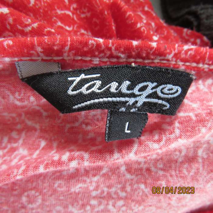 Red and white soft stretch polyester slip over top with tiny cut-on sleeves. Size 40
