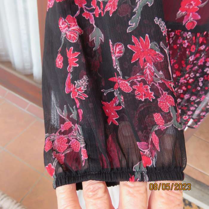 FOSHINI black sheer polyester long sleeve top with red flowers. Tie collar. Size 36