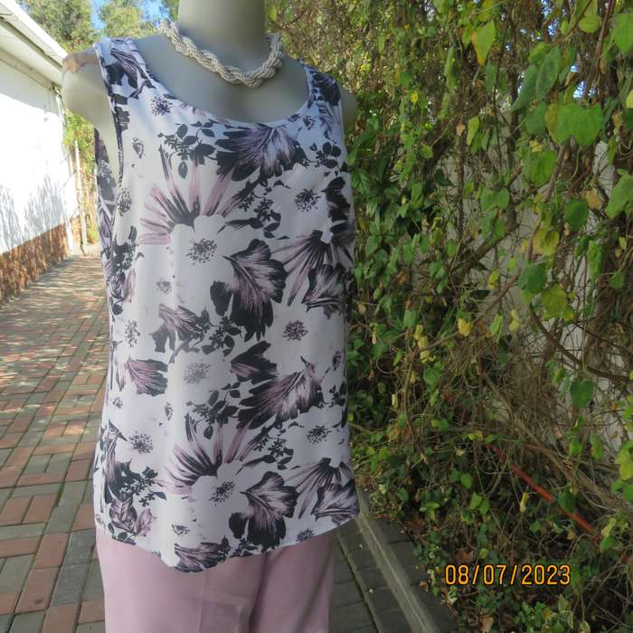 MILADYS white viscose sleeveless slip over top. Bold lilac-black flowers. Size 34