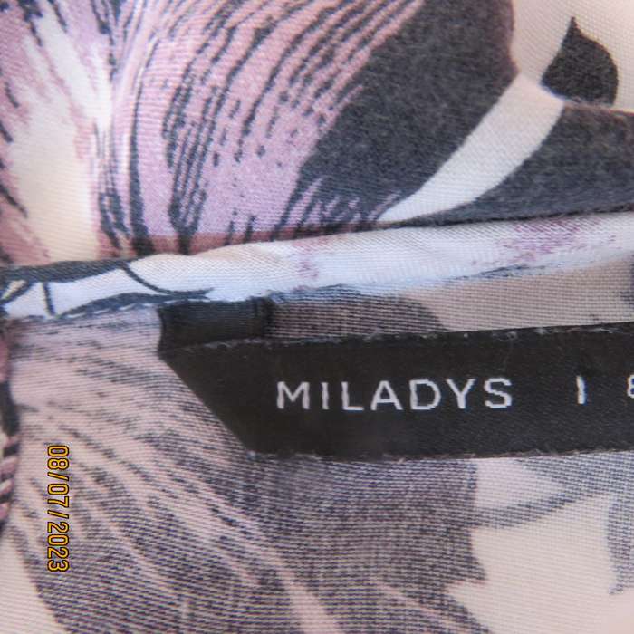 MILADYS white viscose sleeveless slip over top. Bold lilac-black flowers. Size 34