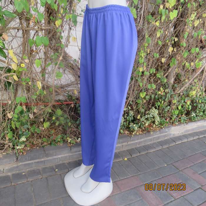 Indigo blue wide cut silky polyester pants size 42. Elasticated waist.