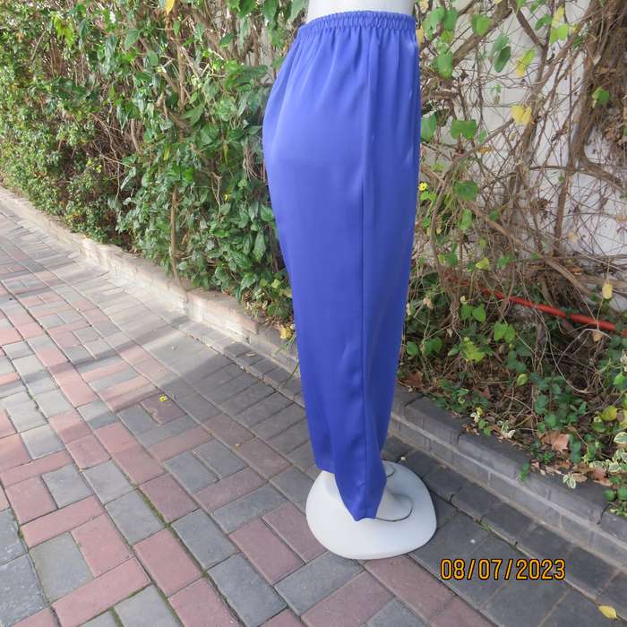 Indigo blue wide cut silky polyester pants size 42. Elasticated waist.