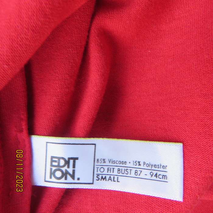 EDITION cherry red slip over V neck poly-viscose top. Size 36. Some stretch.