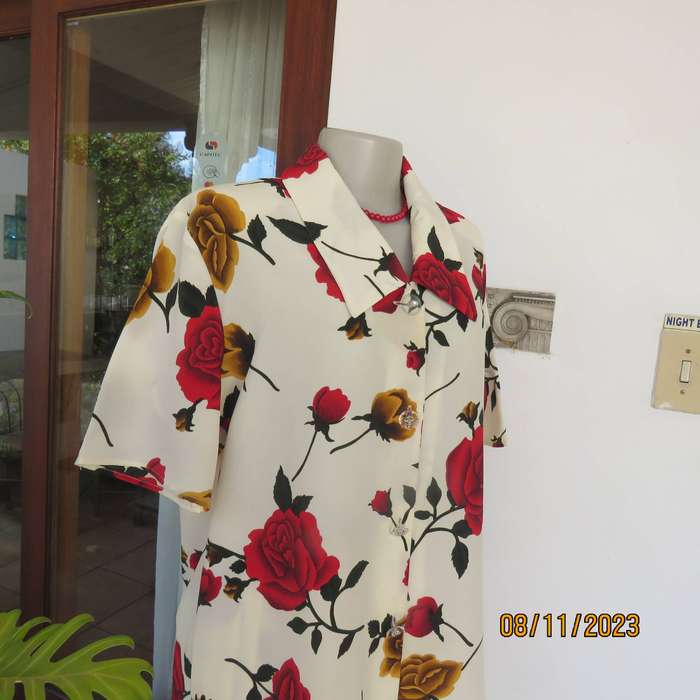 Rich cream with bold red-gold rose print 2 pc outfit size 42. Permanent pleated skirt.