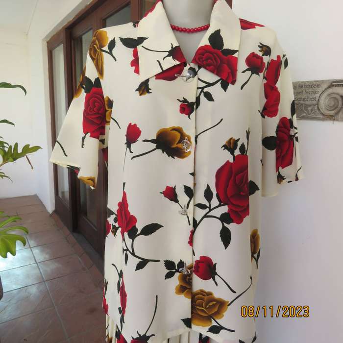 Rich cream with bold red-gold rose print 2 pc outfit size 42. Permanent pleated skirt.