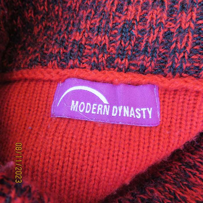 MODERN Dynasty red acrylic knit sweater. Black-red mottled poloneck and ribbings. Size 34-36