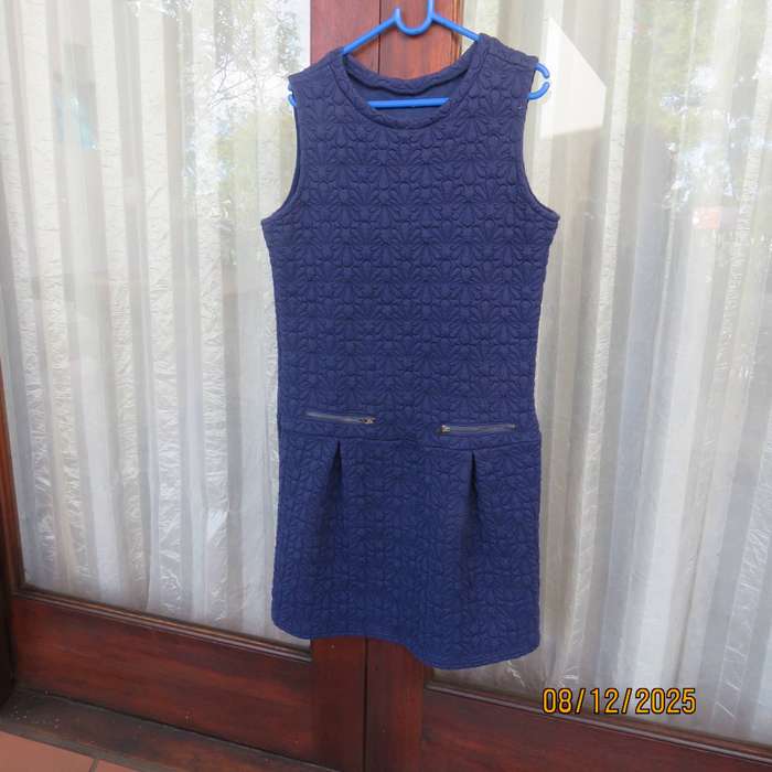 WOOLWORTS navy pinafore-dress with floral padding. For 13-14 year old