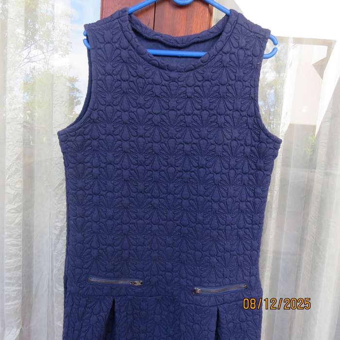 WOOLWORTS navy pinafore-dress with floral padding. For 13-14 year old