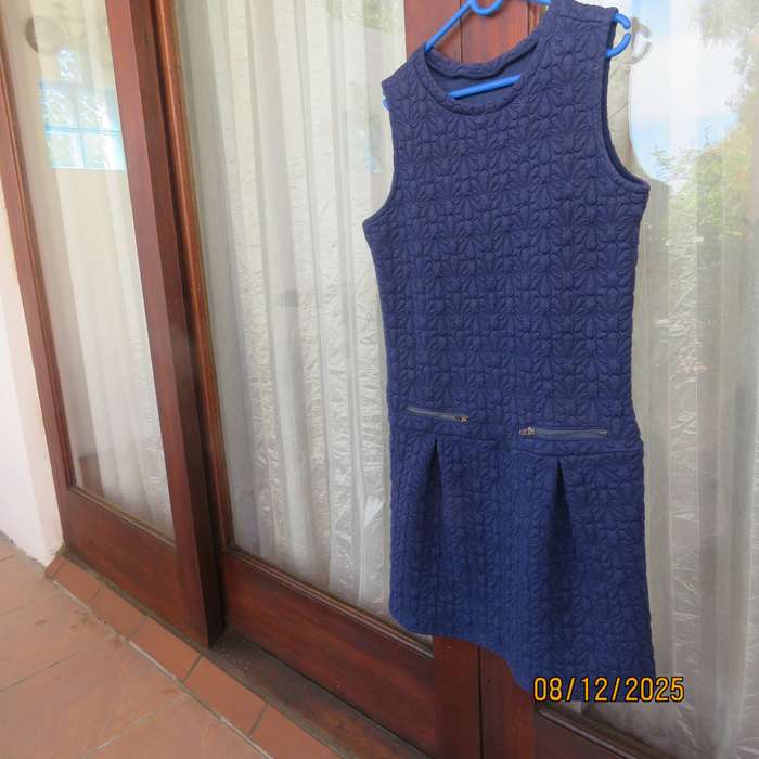 WOOLWORTS navy pinafore-dress with floral padding. For 13-14 year old