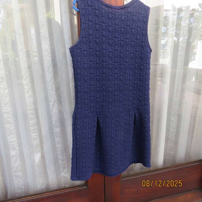WOOLWORTS navy pinafore-dress with floral padding. For 13-14 year old