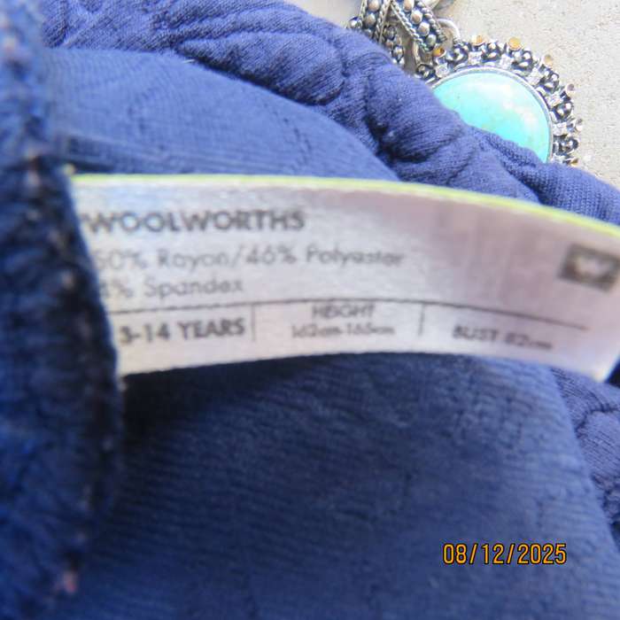 WOOLWORTS navy pinafore-dress with floral padding. For 13-14 year old