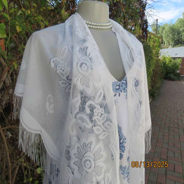 White sheer polyester triangle shawl with scalloped fringed edging. New