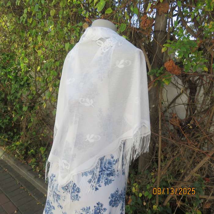 White sheer polyester triangle shawl with scalloped fringed edging. New