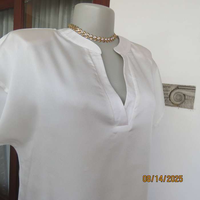 White satin polyester slip over top with banded V front size 36
