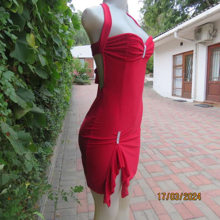Red polyester stretch evening short dress size 34. Decorated. Long straps to tie.