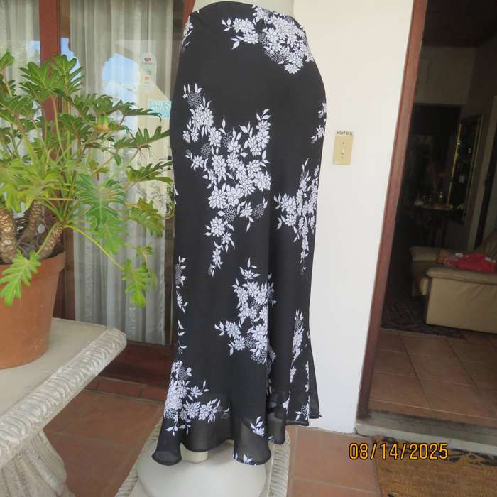 DONNA CLAIRE black sheer polyester with white floral posy print maxi skirt. Size 42
