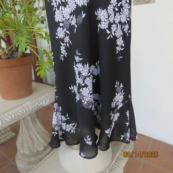 DONNA CLAIRE black sheer polyester with white floral posy print maxi skirt. Size 42