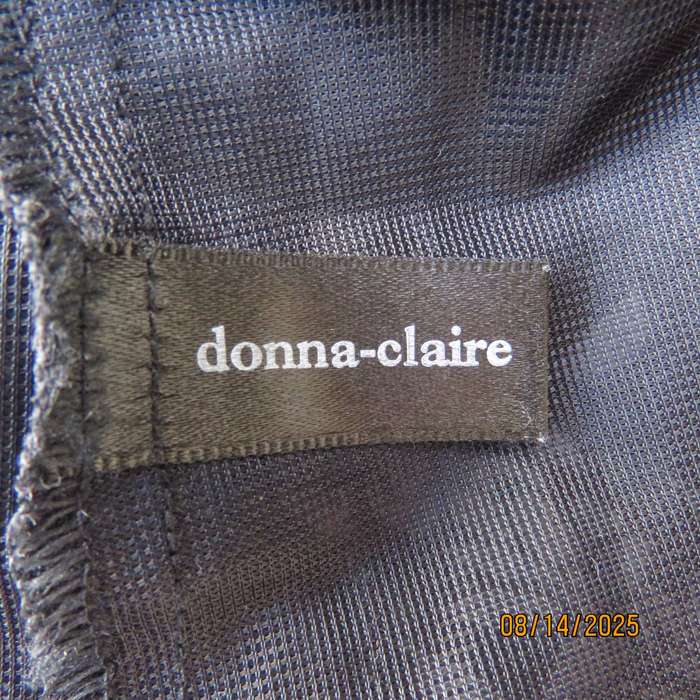 DONNA CLAIRE black sheer polyester with white floral posy print maxi skirt. Size 42