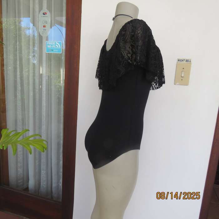 Black stretch viscose body shirt with wide polyester lace collar. Size 36