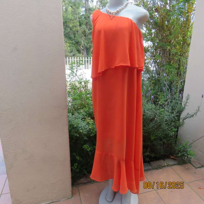 Tangerine free falling sheer polyester one shoulder dress -asymmetrical seamline. Size 38