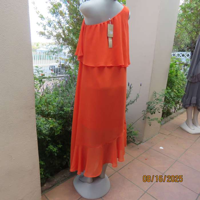 Tangerine free falling sheer polyester one shoulder dress -asymmetrical seamline. Size 38
