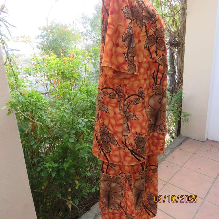 Owner made 2 pc skirt-top outfit in burnt orange and brown. Size 44.