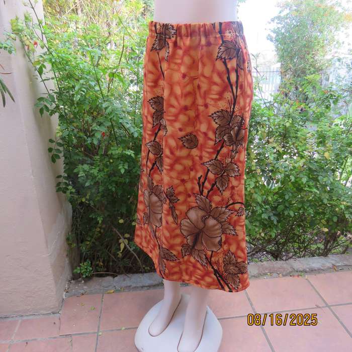 Owner made 2 pc skirt-top outfit in burnt orange and brown. Size 44.